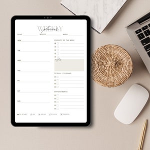 May include: A weekly planner on a tablet screen. The planner has sections for year, month, week, priority of the week, to call/to email, appointments, and notes. There are checkboxes and a to start, ok, delay, stuck, and cancel button.
