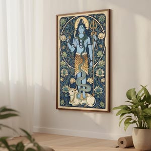 Peut inclure: Une impression d'art encadr&eacute;e repr&eacute;sentant une divinit&eacute; &agrave; la peau bleue tenant un trident et d'autres symboles. L'&oelig;uvre pr&eacute;sente un fond floral d&eacute;taill&eacute; en bleu et vert, avec une vache blanche en bas. Le cadre est de couleur marron chaud.