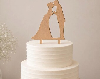 cake topper newlyweds with a kiss