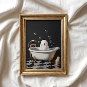 May include: A framed print featuring a cartoon ghost relaxing in a white clawfoot bathtub. The ghost is in the water with bubbles, and the bathroom has a black and white checkered floor. The frame is gold.