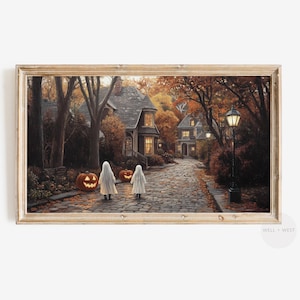 May include: A painting of two children dressed as ghosts trick-or-treating in a neighborhood on Halloween night. The children are walking down a cobblestone street lined with trees and houses. There are jack-o-lanterns on the ground and a streetlight in the background.