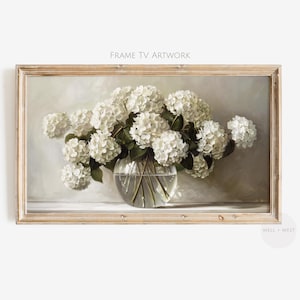 May include: A painting depicting a bouquet of white hydrangeas in a clear glass vase. The flowers are arranged casually, and the vase is placed on a white surface. The background is a subtle, muted grey.