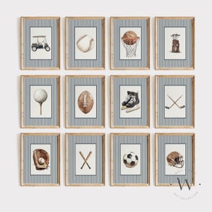 May include: A set of twelve framed wall art prints featuring watercolour illustrations of sports equipment including a golf cart, baseball, basketball, golf bag, golf ball, football, ice skates, hockey sticks, baseball glove, bats, soccer ball, and helmet.