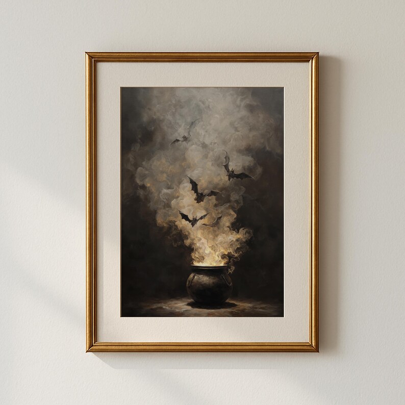 May include: A framed print depicting a cauldron with billowing smoke and bats against a dark background. The artwork has a gothic aesthetic, with a gold frame. The overall theme is Halloween or a similar spooky concept.