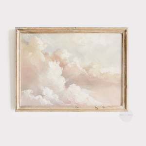 Puede incluir: Una pintura enmarcada de un cielo suave y de ensueño con nubes blancas y esponjosas en tonos de rosa y amarillo.
