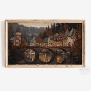 Puede incluir: Una pintura de un pequeño pueblo con un puente sobre un río. Los edificios están iluminados con cálidas luces amarillas, y el río refleja las luces. Los árboles son de color verde oscuro y el cielo es de un suave azul.