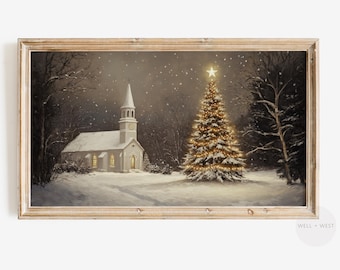 May include: A snowy winter scene with a white church building and a tall, decorated Christmas tree. The church has a steeple with a clock and windows that are lit up. The tree is decorated with white lights and is covered in snow. The scene is set against a dark blue sky with falling snow.