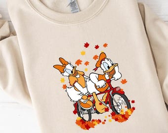 Camiseta de otoño de Disney Donald y Daisy, camiseta de Acción de Gracias con paseo en bicicleta con hojas de otoño, sudadera acogedora con vibraciones otoñales de Disney