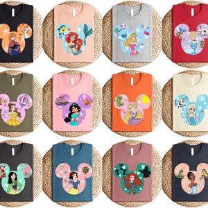 a bunch of tshirts with cartoon characters on them