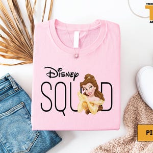 a pink shirt with a picture of a princess on it