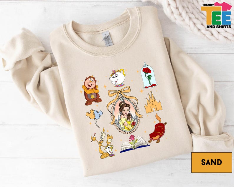 a sweatshirt with a picture of beauty and the beast on it