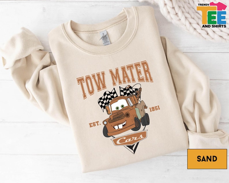 a t - shirt with a tow truck on it
