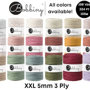 May include: A variety of colors of 5mm, 3-ply cotton rope, each skein is 108 yards (324 feet, 100 meters) long. The rope is labeled "Bobbiny" and is available in a variety of colors, including white, beige, pink, red, orange, yellow, green, blue, purple, and gray.