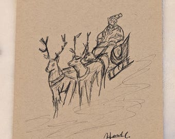 May include: A pencil sketch on tan paper depicts Santa Claus in a sleigh pulled by three reindeer. The drawing style is simple, with visible pencil strokes. The artist's signature is in the lower right corner. The image evokes a Christmas theme.