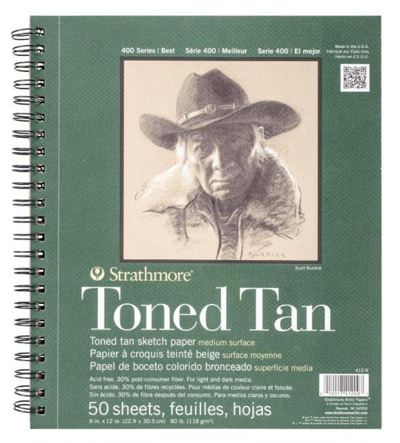 May include: A green spiral-bound Strathmore Toned Tan sketchbook. The cover features a pencil drawing of a person wearing a cowboy hat. The sketchbook contains 50 sheets of acid-free, toned tan sketch paper, measuring 9 x 12 inches.
