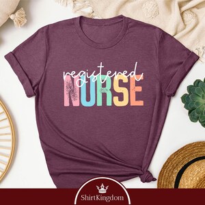 a women's t - shirt with the words restated nurse on it