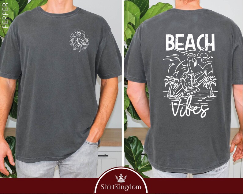 a man wearing a t - shirt that says beach vibes