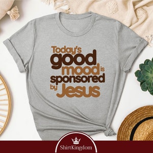 a t - shirt with the words today's good mood is sponsored by jesus