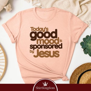 a t - shirt with the words today's good mood is sponsored by jesus