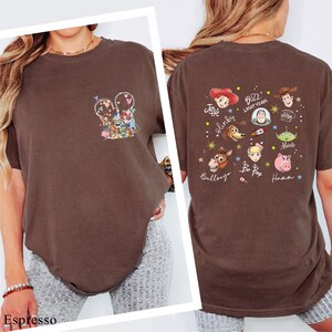 The image is a collage of two photos of a woman wearing a brown t-shirt with various Disney characters and text printed on it.