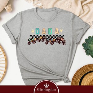 a t - shirt with the words dad on it