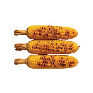 May include: Three ears of corn on the cob, grilled and charred, stacked on top of each other.