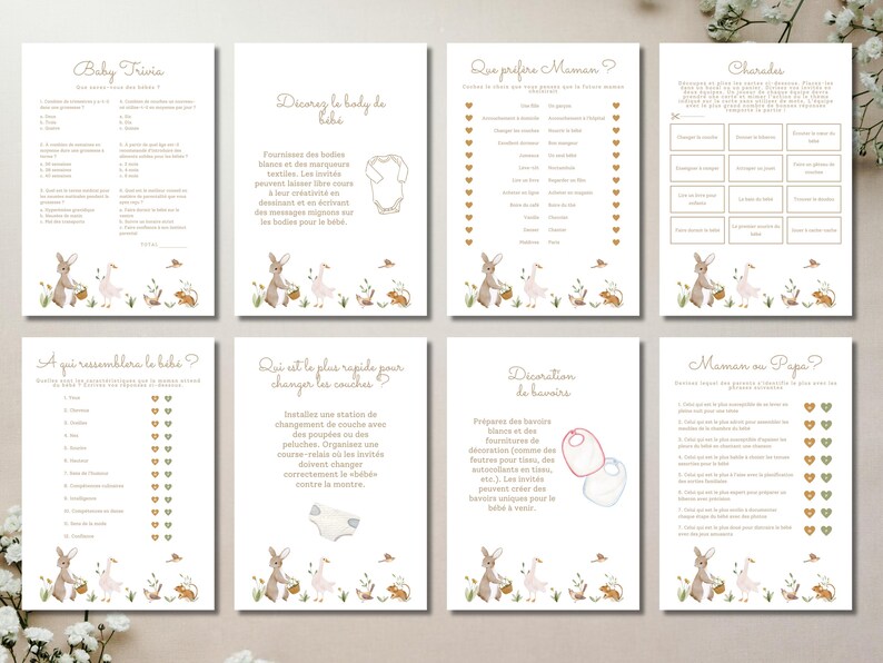 May include: A set of eight baby shower game cards with a watercolor bunny and floral design. The cards feature various games, including trivia, charades, and guessing games, with text in a soft, elegant font. The overall color scheme is cream and gold.