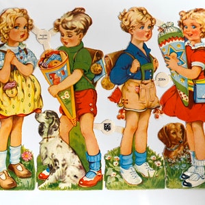 May include: Four children, two girls and two boys, dressed in traditional German clothing, are holding school supplies and standing with their dogs. The children are wearing backpacks and carrying a cone-shaped treat called a 'Schultüte'.