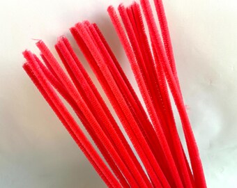May include: A bundle of bright red pipe cleaners. The pipe cleaners are soft and flexible, and they are perfect for crafting.