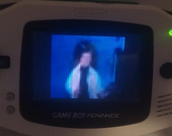 Rick roll prank Nintendo gameboy advance sp ds GBA cartridge with full music video of rick astley never gonna give you up