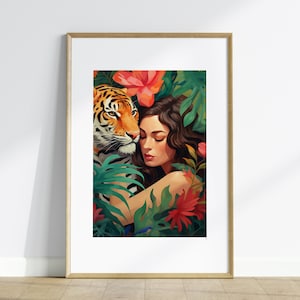 May include: A framed art print featuring a woman and a tiger surrounded by lush greenery and vibrant red flowers. The woman has long brown hair and is resting her head against the tiger. The artwork has a soft, painterly style.