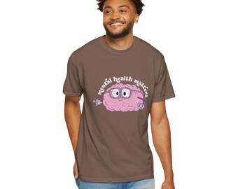 May include: A brown t-shirt featuring a cartoon brain wearing glasses and the text "mental health matters".