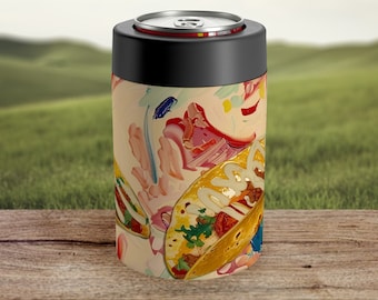 May include: A black and silver can cooler with a vibrant abstract design of tacos. The cooler has a black top and a cylindrical shape. The artwork includes red, yellow, and blue brushstrokes, and the image of a taco.