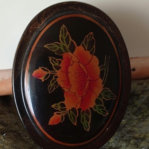 Asian lacquered wooden box with floral pattern