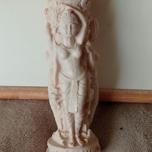 Asian caryatid vase sculpture