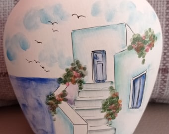 Small handmade vase with motifs of a street in Greece