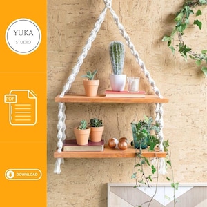 May include: Two wooden shelves with a white rope hanging system. The shelves are filled with potted plants and decorative items. The shelves are mounted on a cork wall.