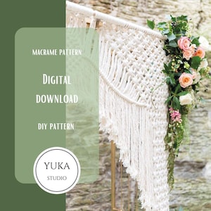 May include: A white macrame wall hanging with fringe, hanging from a wooden dowel. The macrame is in the shape of a half circle. The text "MACRAME PATTERN", "DIGITAL DOWNLOAD", and "DIY PATTERN" is visible on the left side of the image. The text "YUKA STUDIO" is visible in a circle on the left side of the image.