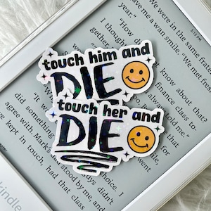 May include: Two holographic stickers with the text "touch him and die" and "touch her and die" in black with a yellow smiley face on each.