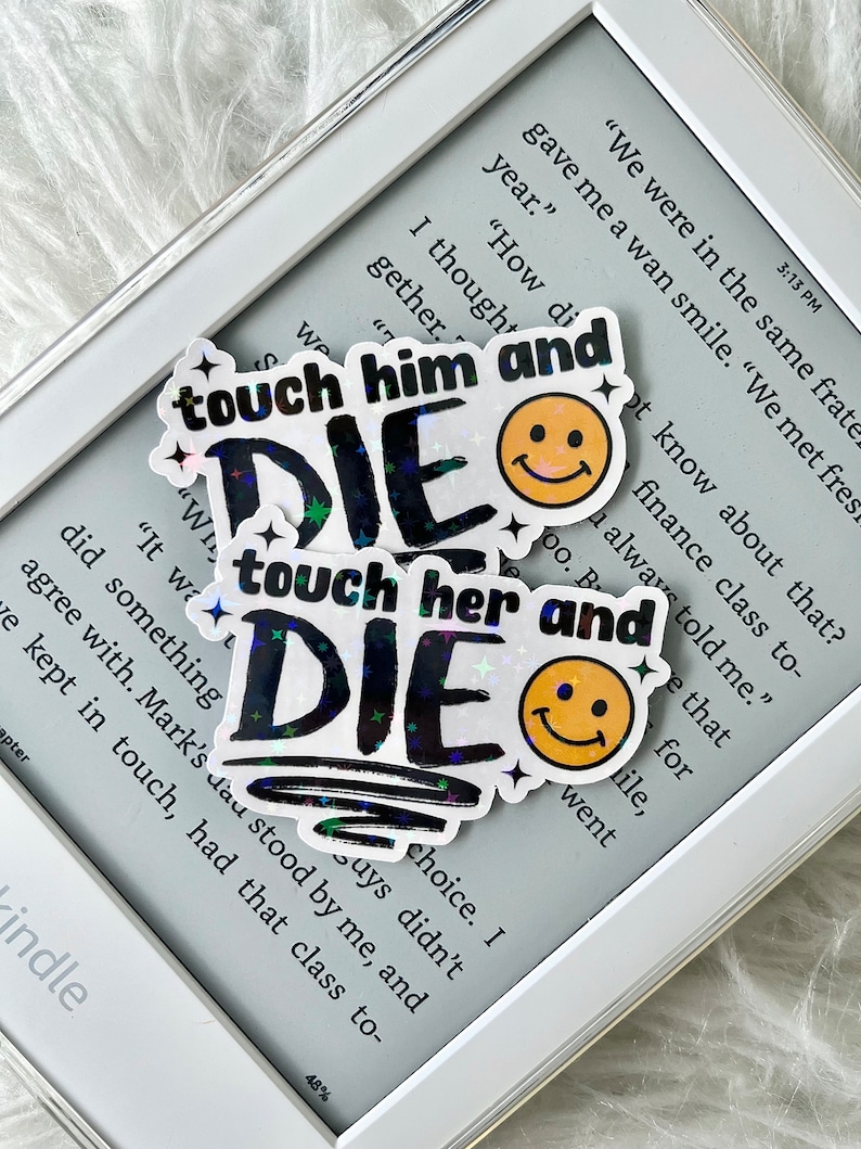 May include: Two holographic stickers with the text "touch him and die" and "touch her and die" in black with a yellow smiley face on each.