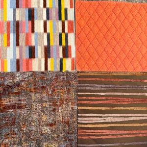 May include: Four different rug samples are displayed. The top left rug has a colorful vertical stripe pattern. The top right rug is a solid orange with a diamond pattern. The bottom left rug has a distressed look. The bottom right rug has horizontal stripes.