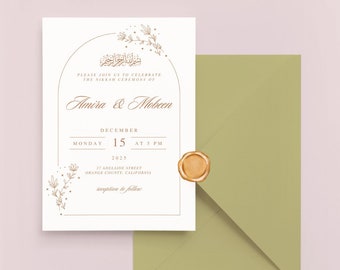 May include: A white wedding invitation with gold calligraphy. The invitation features a floral arch with the text "PLEASE JOIN US TO CELEBRATE THE NIKKAH CEREMONY OF Amira & Mobeen DECEMBER MONDAY 15 AT 5 PM 2025 27 ADELAIDE STREET ORANGE COUNTY, CALIFORNIA reception to follow".