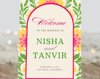 May include: Welcome sign for a Mehndi celebration for Nisha and Tanvir, featuring a floral design with yellow and pink flowers, green leaves, and a red arch. The text reads "Welcome to the Mehndi of Nisha and Tanvir, February 8, 2025, San Diego, California."