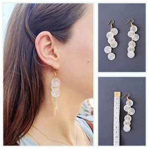 White hanging earrings