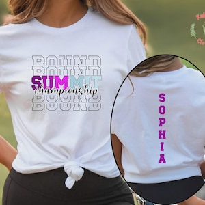 May include: White t-shirt with the text "ROUND SUMMIT championship BOUND" in a stacked design. The word "SUMMIT" is in purple and the word "championship" is in teal. The back of the shirt has the name "SOPHIA" in purple.