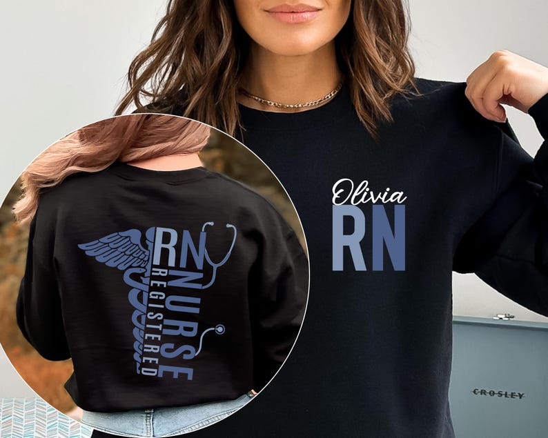 May include: Black sweatshirt with a blue and white graphic of a caduceus and the text "RN NURSE REGISTERED" on the back. The front of the sweatshirt has the text "Olivia RN" in blue and white.