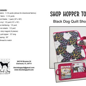 May include: The image showcases a Shop Hopper Tote from Black Dog Quilt Shop. The tote features a colorful pattern with a pink handle and trim. The design includes a smaller pocket with a magazine inside. The image also includes a list of requirements for the tote.