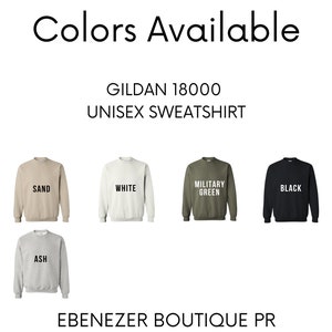 May include: Five Gildan 18000 unisex sweatshirts in different colors: sand, white, military green, black, and ash. The text "Gildan 18000 Unisex Sweatshirt" and "Ebenezer Boutique PR" are visible below the sweatshirts.
