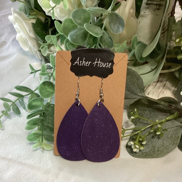 Beautiful hand-painted wooden earrings that are unique and very light-weight.