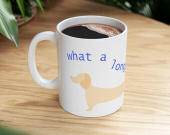 Meet your new favorite mug. A blond dachshund and the reminder you needed most wrapped around every sip. What a long day indeed.